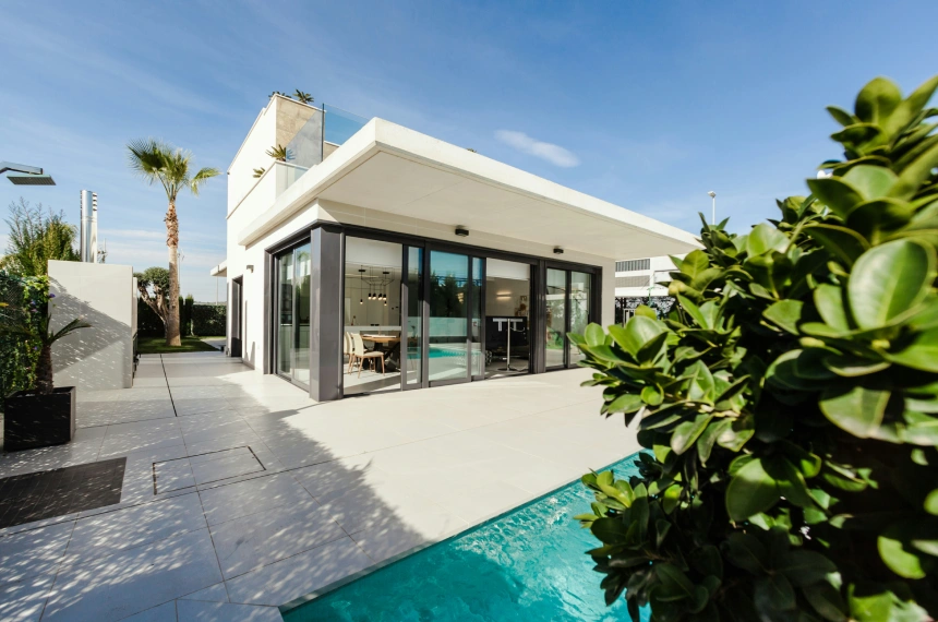 A large pool with a nice view of the outside.